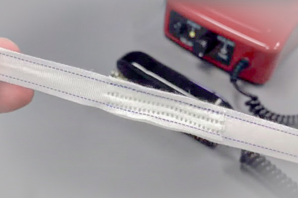 Ultrasonic-machine-to-connect-ironer-guide-tapes