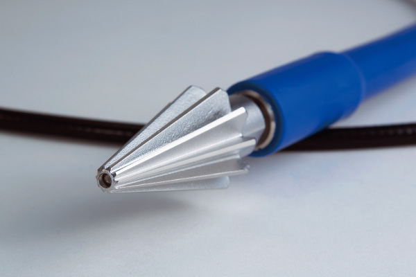 Original design including 10 angled blades completely removes even small scales.